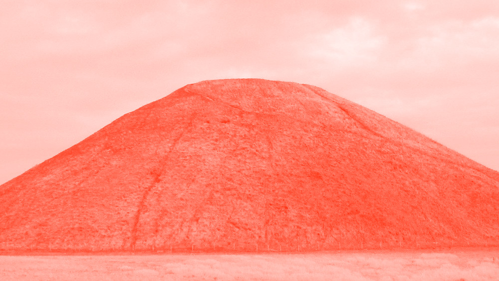 A semi-symmetrical hill, colorised in a pink hue.